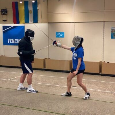 Coach Wes teaching fencing